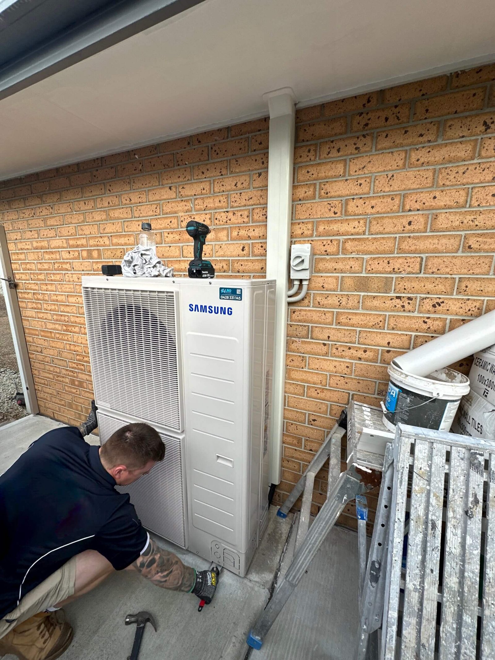 Outdoor AC unit installation