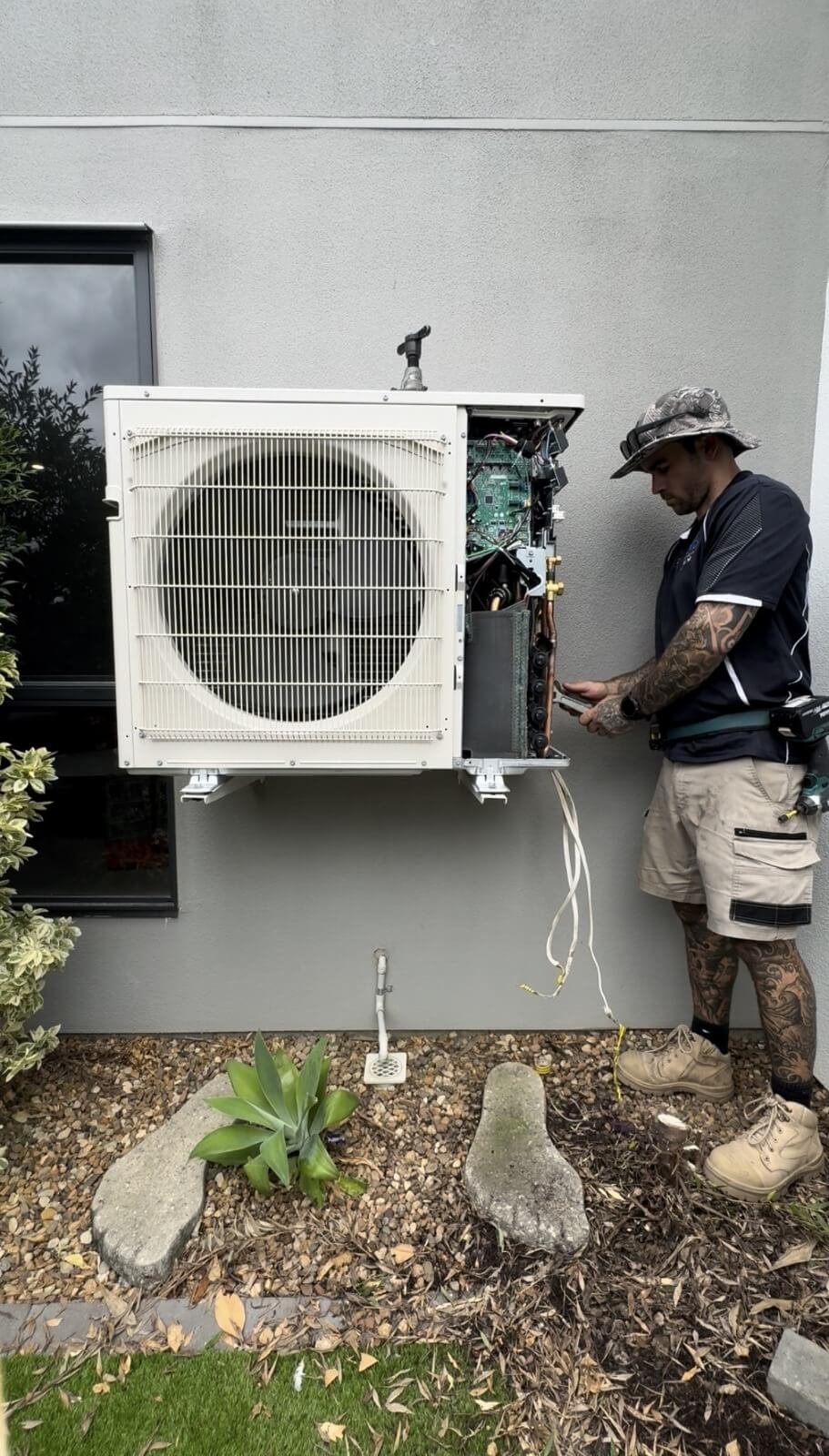 Licensed HVAC technician flaring and fitting refrigerant pipework to Mitsubishi Electric multi split air conditioning system